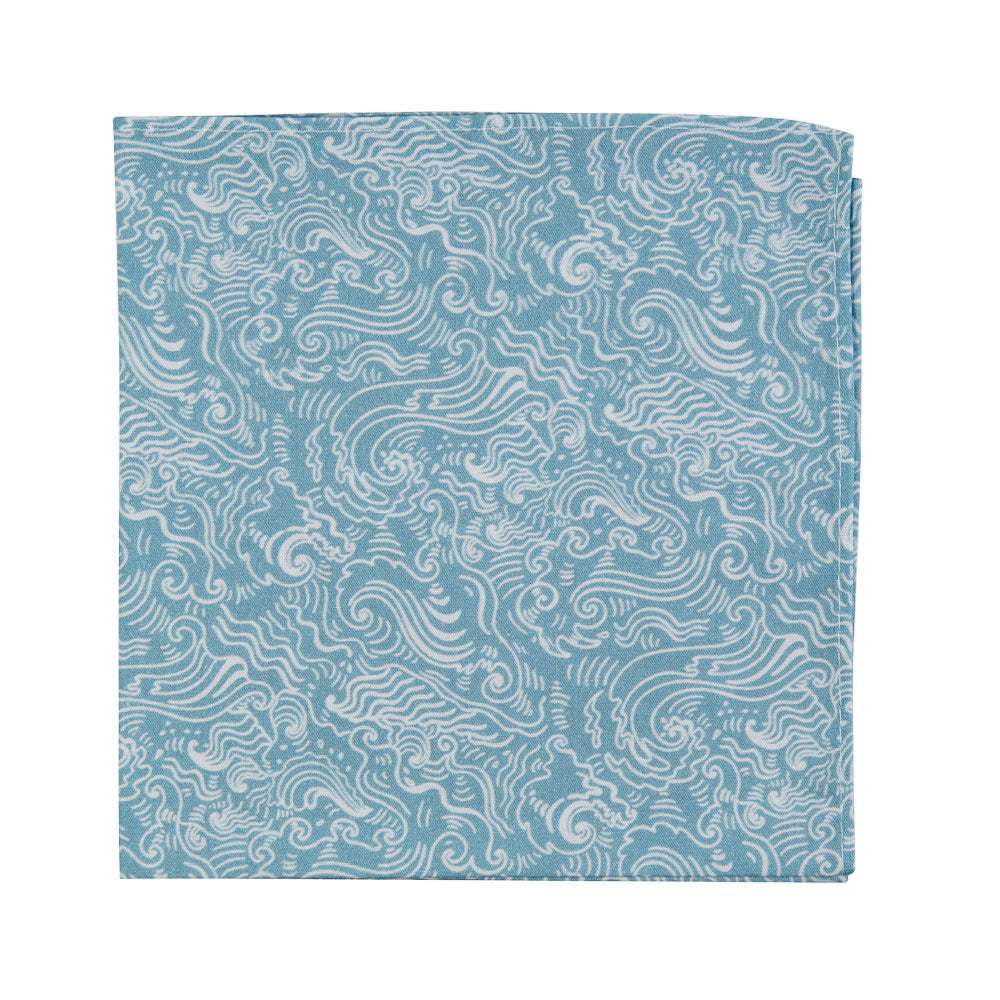 Riptide Pocket Square. Light blue background with white ocean wave pattern throughout.