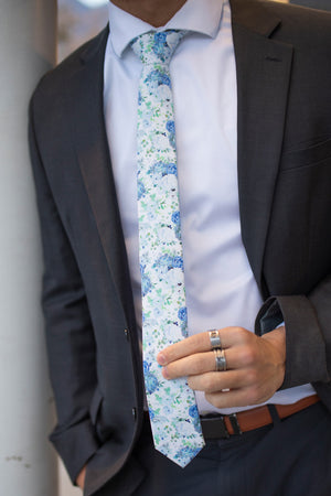 Arctic Ice tie worn with a white shirt and black suit.