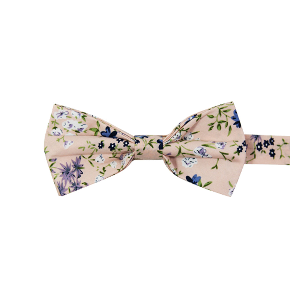 Babys Breath Pre-Tied Bow Tie. Blush background with blue, white and lavender flowers, with green leaves and stems.