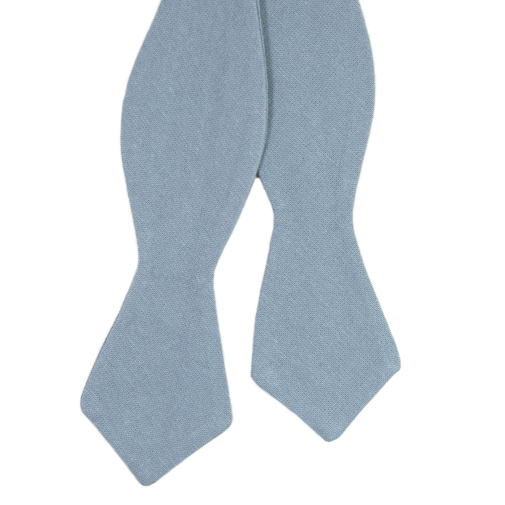 Dusty Self Tie Bow Tie. Solid light blue textured fabric.