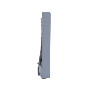 Solid gray metal tie bar standing on one end.