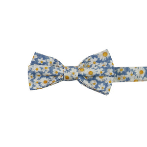 Mahalo Floral Pre-Tied Bow Tie. Dusty blue background with medium sized white and yellow daisy flowers throughout.