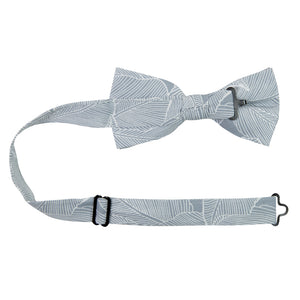 Palm Pre-Tied Bow Tie with Adjustable Neck Strap. Blue/gray background with white palm leaf pattern over entire tie.