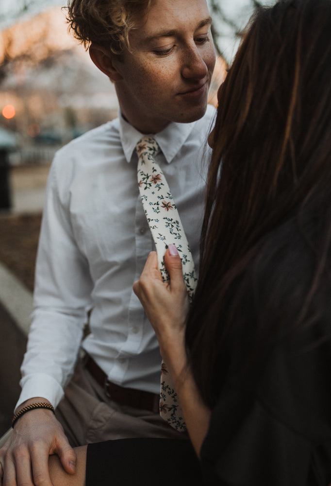 Sugar Blossom tie worn with a white shirt and khaki pants.