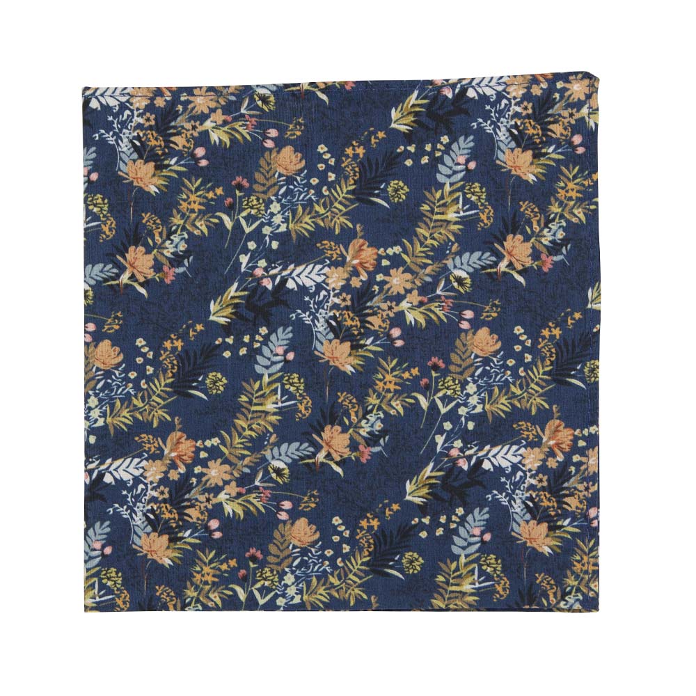 Tiger Lily Pocket Square. Dark navy blue background with peach flowers and dusty blue, yellow, green and black leaves.