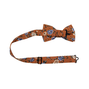 Western Pre-Tied Bow Tie with adjustable neck strap. Orange background with blue and white flowers and small green leaves throughout.