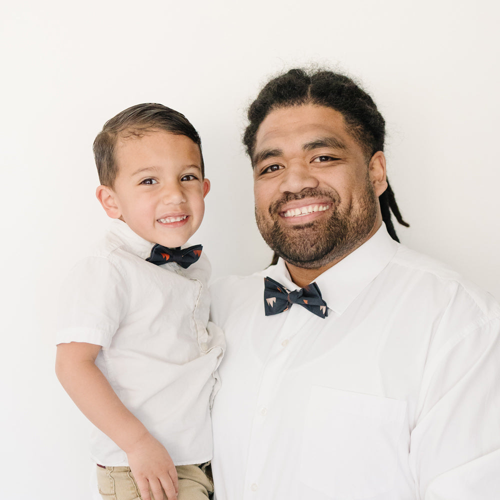 DAZI Utah Bow Ties worn by father and son in white shirts.