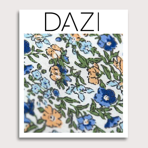 Alpine Blum Fabric Swatch Sample. 3" x 4" fabric sample on cardstock. White background with small blue and yellow flowers, small green leaves throughout.