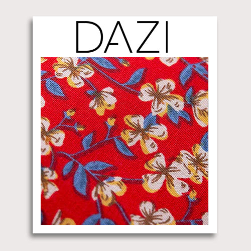 Blaze Fabric Swatch Sample. 3" x 4" fabric sample on cardstock. Red background with white and yellow gold flowers and dusty light blue leaves. 