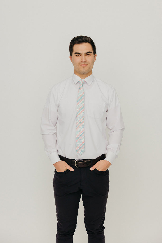 Aztec 2.5" Wide Skinny Tie worn with a white shirt, black belt and black suit pants.