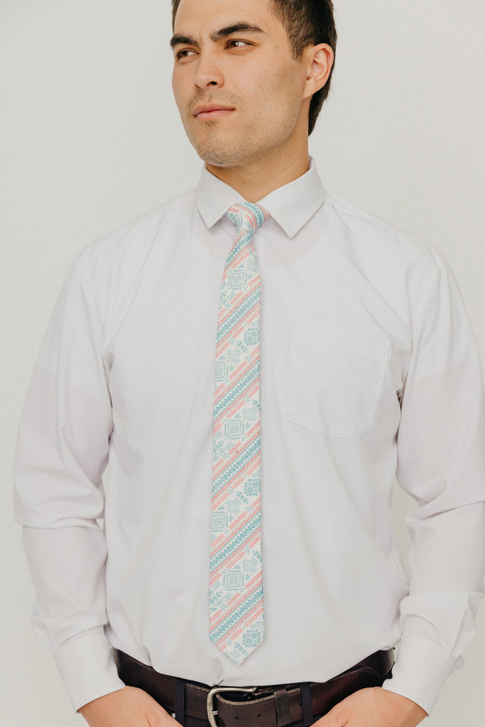 Aztec 2.5" Wide Skinny Tie worn with a white shirt, black belt and black suit pants.