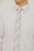 Aztec 2.5" Wide Skinny Tie worn with a white shirt, black belt and black suit pants.