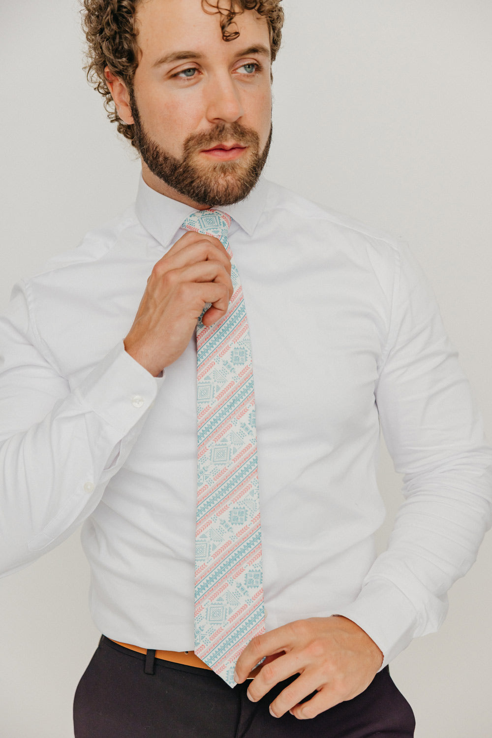 Aztec 3" Wide Standard Tie worn with a white shirt, brown belt and black suit pants.