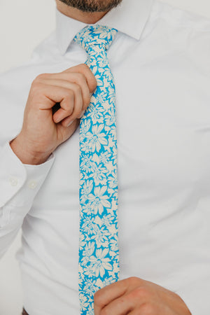 Blue Daisy 2.5" Wide Skinny Tie worn with a white shirt.