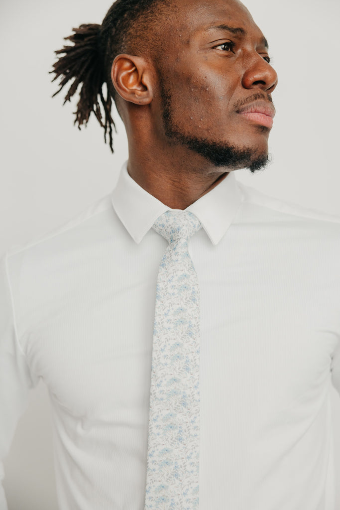 Bluebell tie worn with a white shirt.