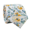 Butterscotch Skinny Tie. White background with yellow gold flowers and mint sage green leaves.