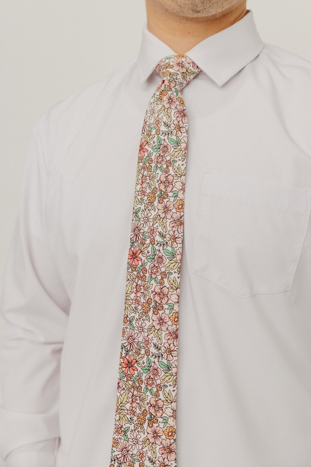 Carnation 3" Wide Standard Tie worn with a white shirt, black belt and black suit pants.