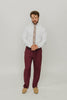 Carnation 2.5" Wide Skinny Tie worn with a white shirt, tan belt and maroon suit pants.