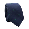 Cedar Spots Skinny Tie. Navy blue background with sage green spots. 
