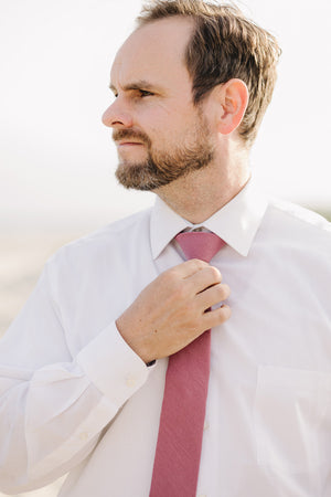 Dusty Rose Tie worn with a white shirt.
