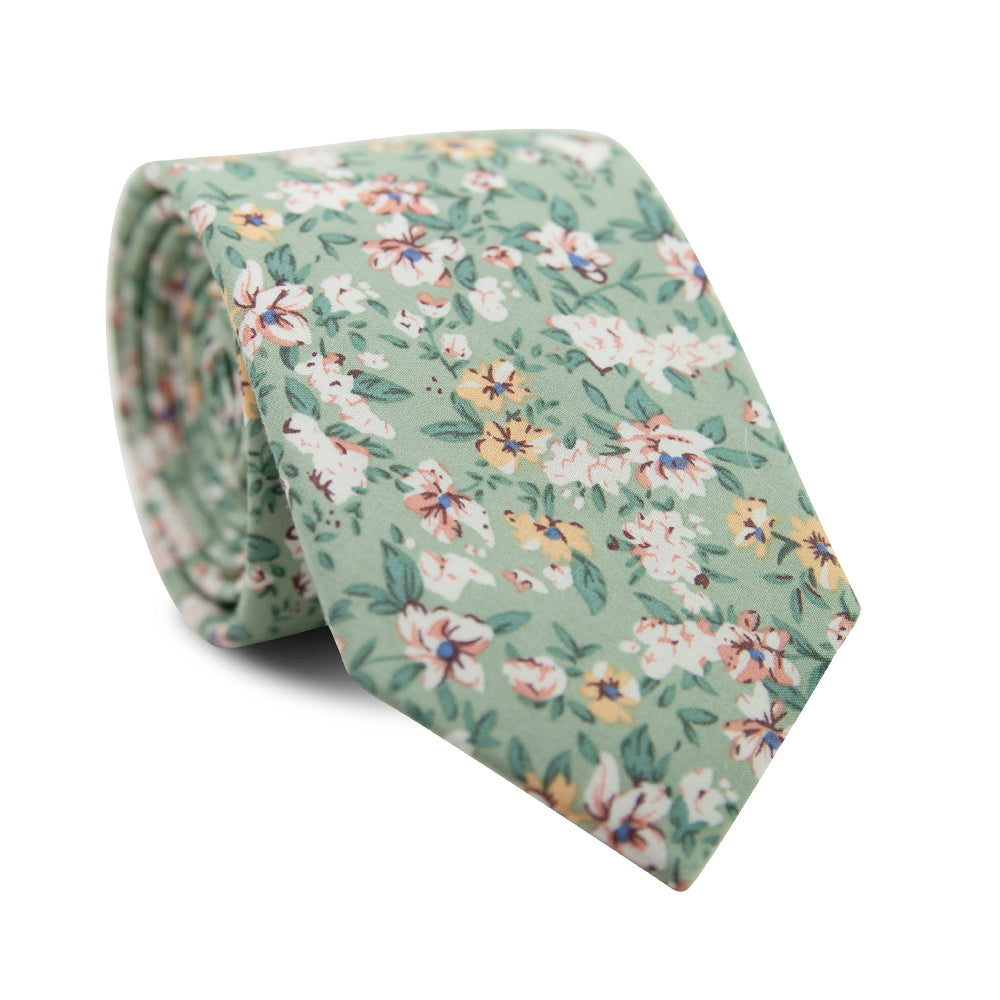 Faded Jade Skinny Tie. Sage background with white, blush and yellow flowers with blue flower centers, dark sage leaves.