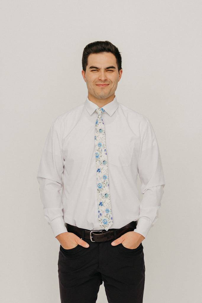 French Love 2.5" Wide Skinny Tie worn with a white shirt, black belt and black suit pants.