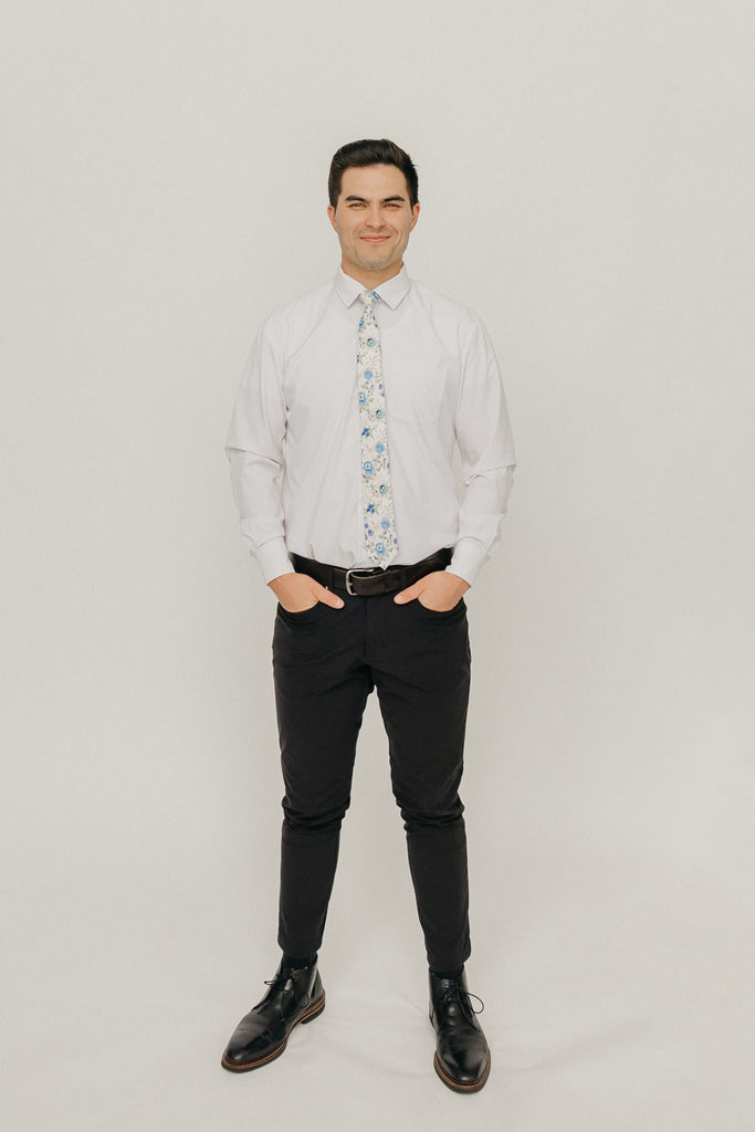 French Love 2.5" Wide Skinny Tie worn with a white shirt, black belt and black suit pants.