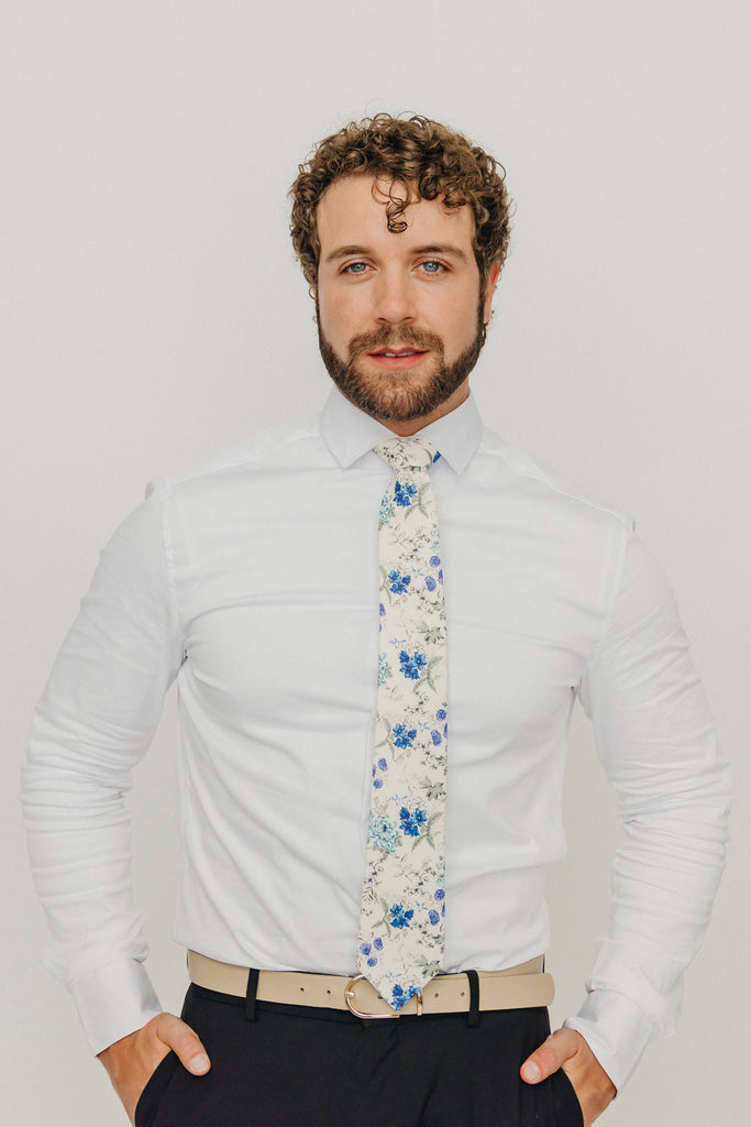 French Love 3" Wide Standard Tie worn with a white shirt, tan belt and black suit pants.