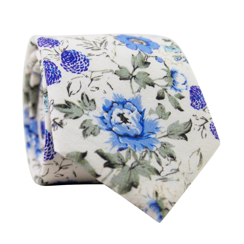 French Love Skinny Tie. White background with blue flowers and green leaves.