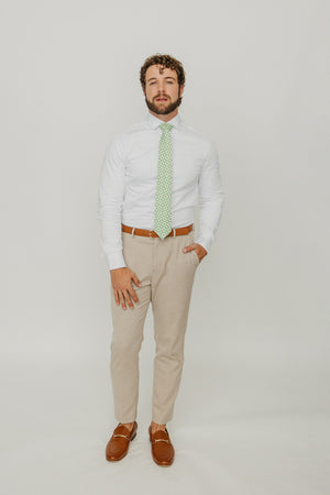 Groovy 3" Wide Standard Tie worn with a white shirt, brown belt and tan suit pants.