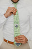 Groovy 3" Wide Standard Tie worn with a white shirt, brown belt and tan suit pants.