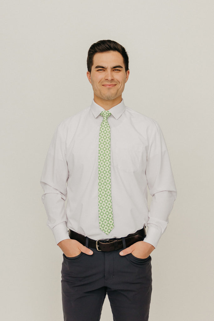 Groovy 2.5" Wide Skinny Tie worn with a white shirt, black belt and black suit pants.