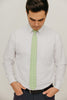 Groovy 2.5" Wide Skinny Tie worn with a white shirt, black belt and black suit pants.