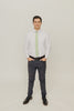 Groovy 2.5" Wide Skinny Tie worn with a white shirt, black belt and black suit pants.