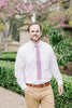 Lilas Tie worn with a white shirt and tan pants.