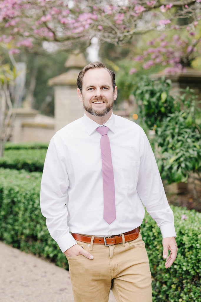Lilas Tie worn with a white shirt and tan pants.