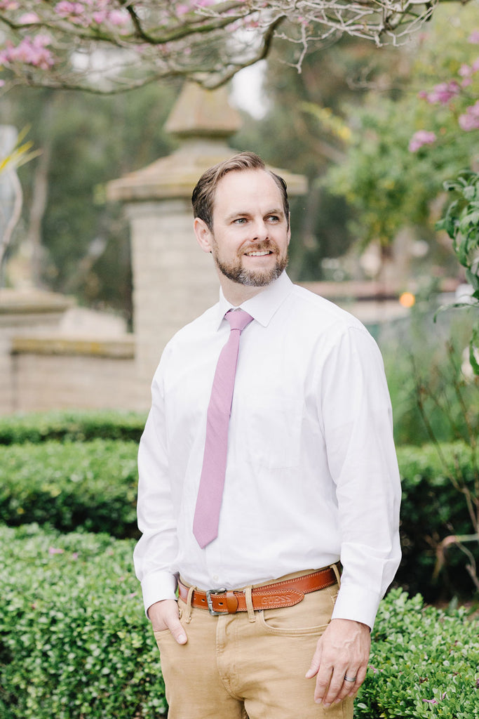 Lilas Tie worn with a white shirt and tan pants.