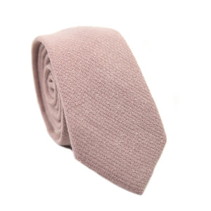 Mauve Skinny Tie. Solid pink textured fabric.