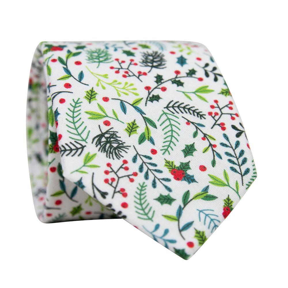 DAZI Mistletoe Skinny Tie. White background with different shades of green leaves and mistletoe throughout.