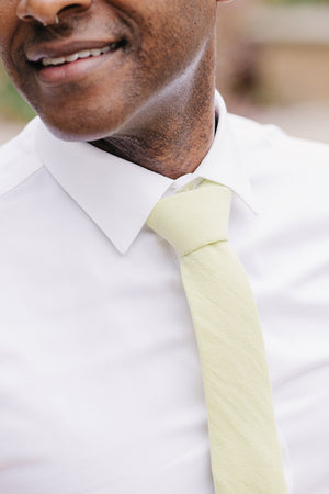 Pale Lime tie worn with a white shirt.