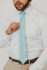 Riptide 3" Wide Standard Tie worn with a white shirt, brown belt and tan suit pants.