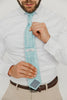 Riptide 3" Wide Standard Tie worn with a white shirt, brown belt and tan suit pants.