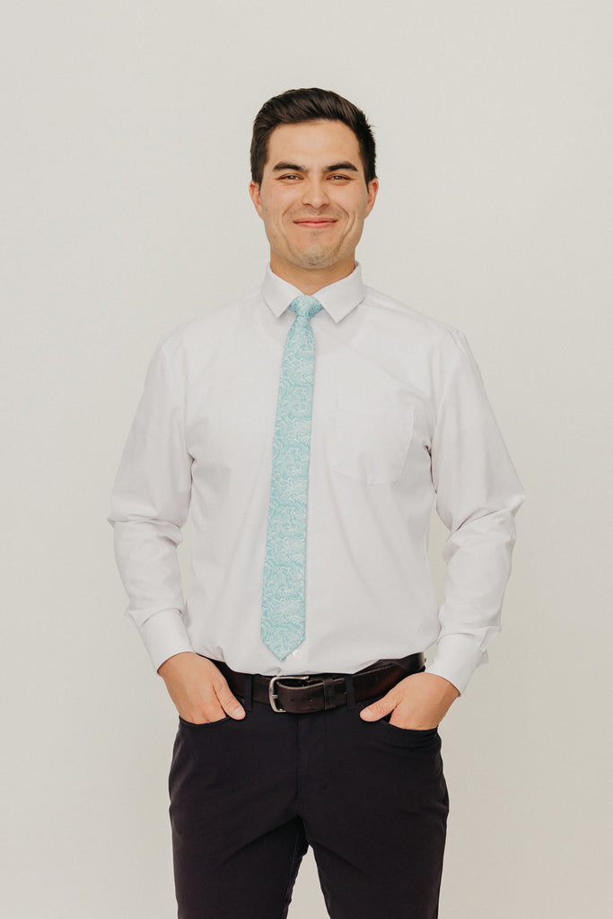 Riptide 2.5" Wide Skinny Tie worn with a white shirt, black belt and black suit pants.