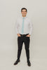 Riptide 2.5" Wide Skinny Tie worn with a white shirt, black belt and black suit pants.