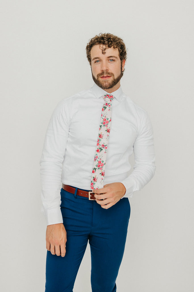 Rose Garden 2.5" Wide Skinny Tie worn with a white shirt, brown belt and royal blue suit pants.