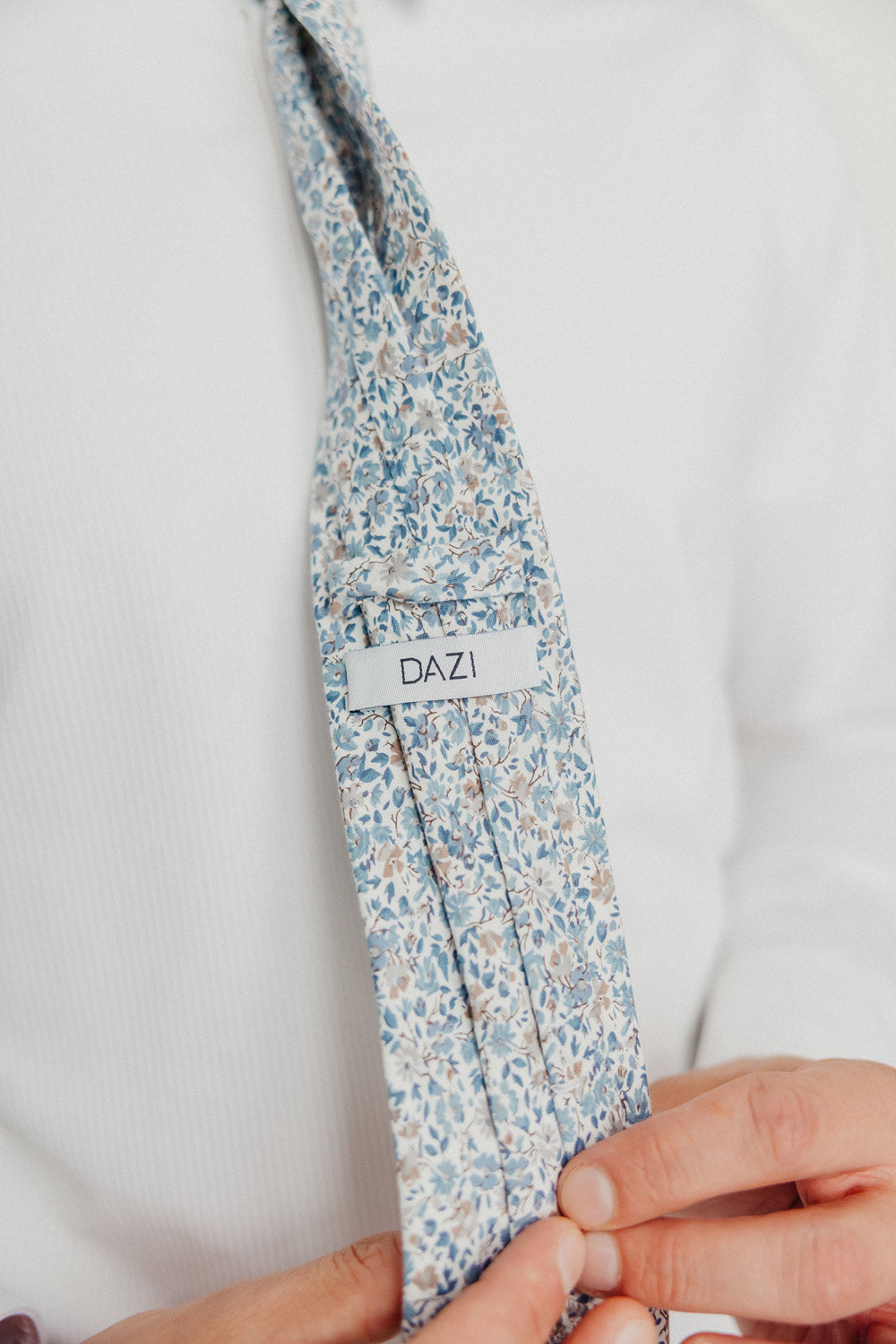 Scorpion Grass tie worn with a white shirt.
