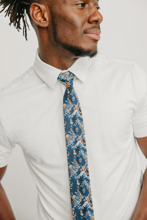Tiger Lily tie worn with a white shirt.