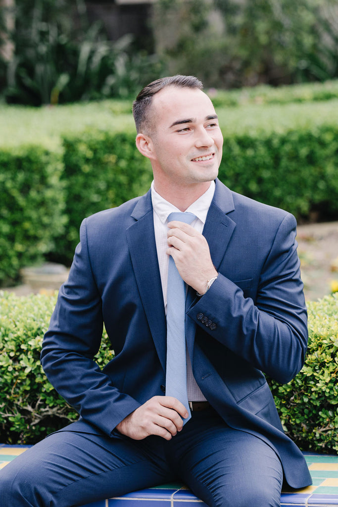 Twilight tie worn with a white shirt and blue suit.