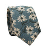 Winter Garden Skinny Tie. Sage dusty green background with offwhite cream sunflowers and dark green centers and leaves and stems.