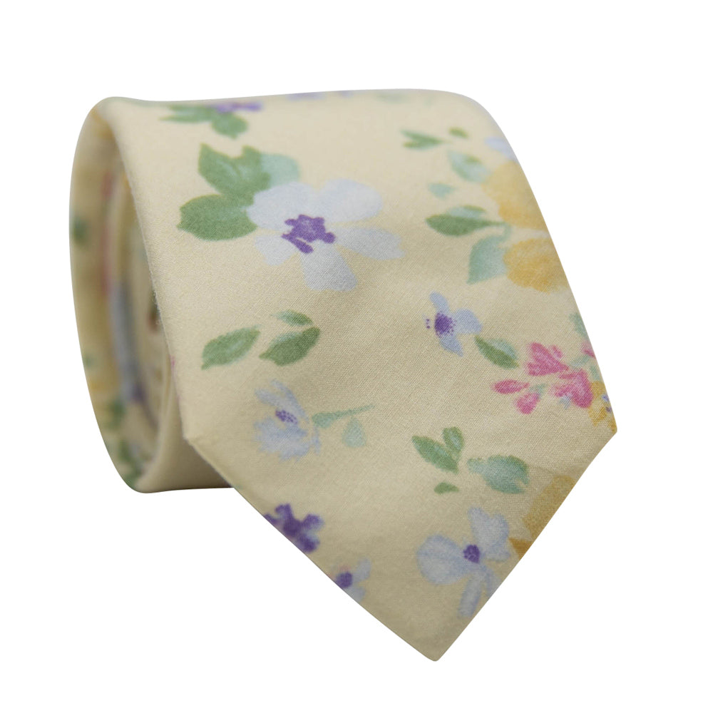 Yellow Freesia Necktie. Yellow background with small blue, yellow, pink and purple flowers with green leaves. 